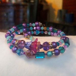 Pretty Czech beaded bracelet with crystals on memory wire in shades of t…